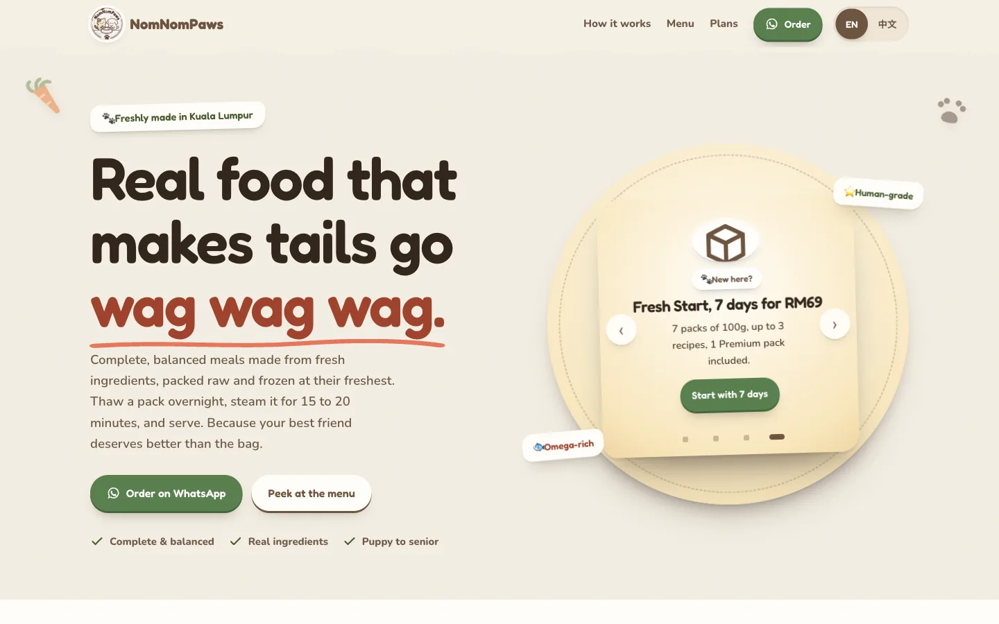 The nomnompaws.com home page: fresh dog food meals and the order-on-WhatsApp flow.